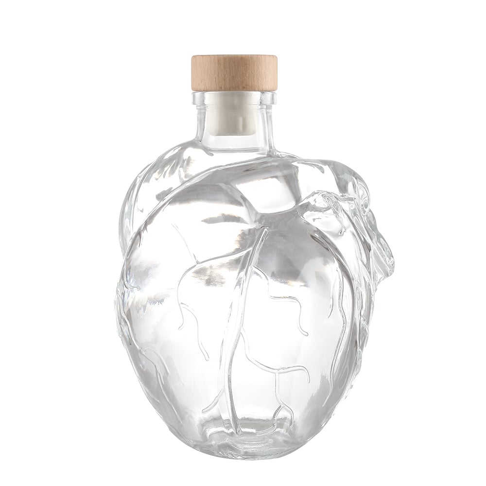 Crystal white glass spirit bottles, empty liquor bottles in 700ml and 750ml. Suitable for whisky, brandy, vodka, tequila and other spirits. Support custom processes such as coloring and electroplating. Equipped with cork stoppers.
