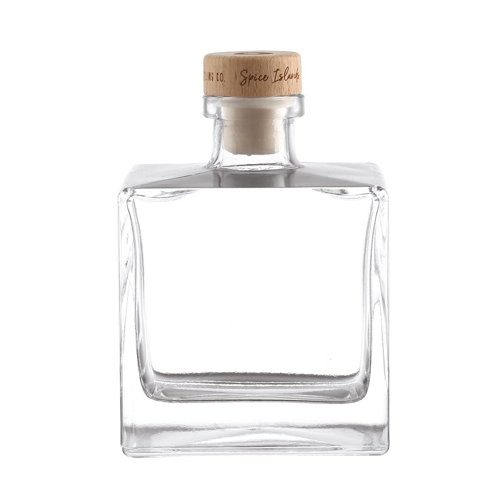Best-selling crystal white glass spirit bottles, empty liquor bottles available in 700ml and 750ml, ideal for premium spirits including whisky, brandy, vodka, tequila, XO, and other distilled liquors. Custom bottle stoppers are available, and we support c