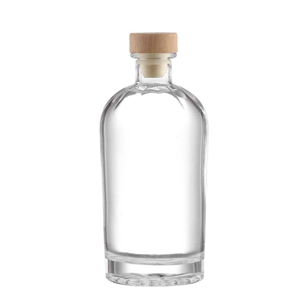 Factory direct sales of high-end, premium crystal white, high-transparency glass bottles. Dome-shaped, short and stout body with thickened bottom. 700ml/750ml empty bottles suitable for brandy, rum, tequila, whiskey, liqueurs, and other spirits. We suppor