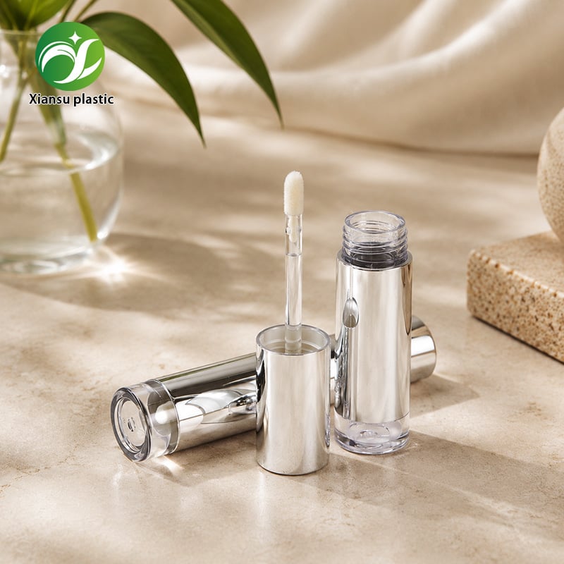 Round ABS Lip Gloss Tube with Silver Electroplated Finish, Soft Applicator Brush and Transparent Base for Liquid Lipstick & Lip Tint Cosmetic Packaging OEM Supplier