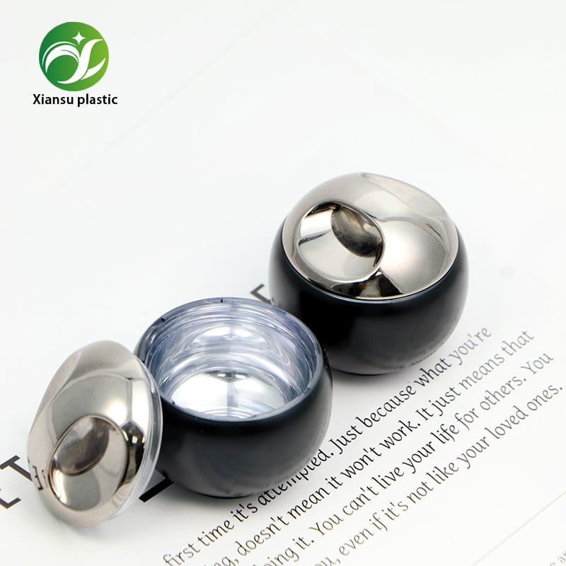 10 ml ABS mini zwarte bolvormige crèmejar voor cosmetische verpakking, inclusief spatel en ronde schroefdeksel; lege verpakking voor oogcrème, gezichtscrème en lipmaskers; reisformaat