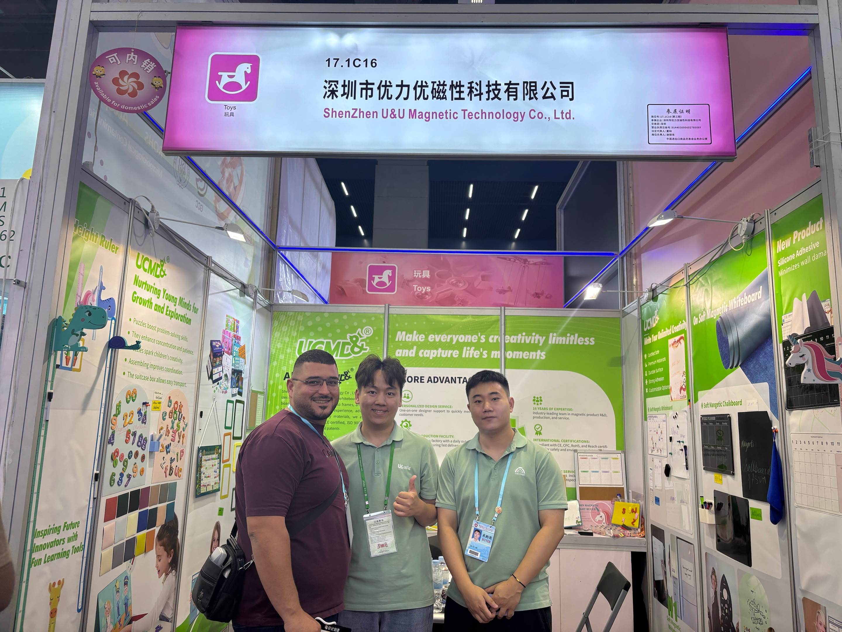 All smiles in front of Booth 17.1C16