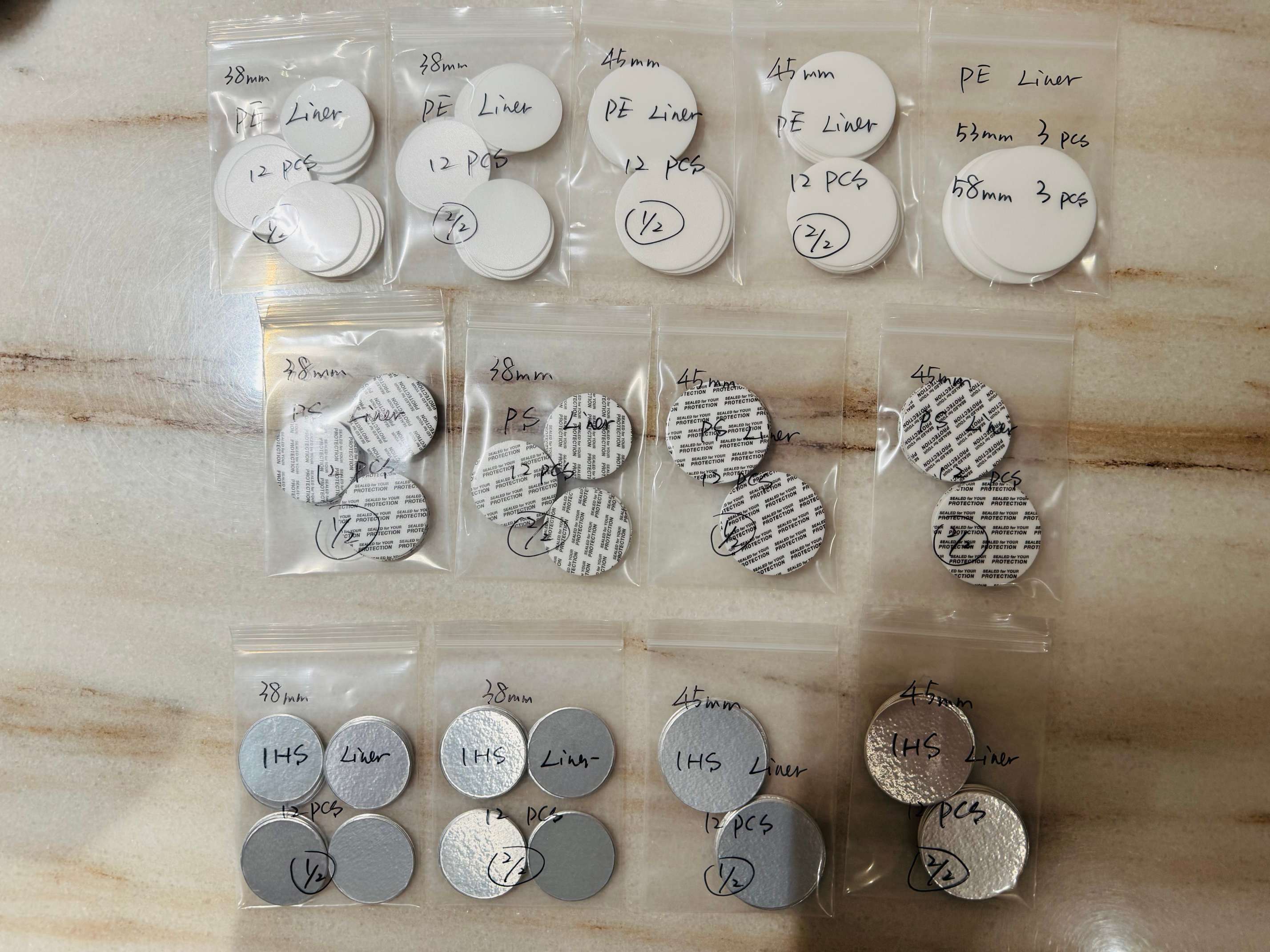 uniseel-induction-heat-seal-ihs-ps-pe-liner-testing-array.jpg