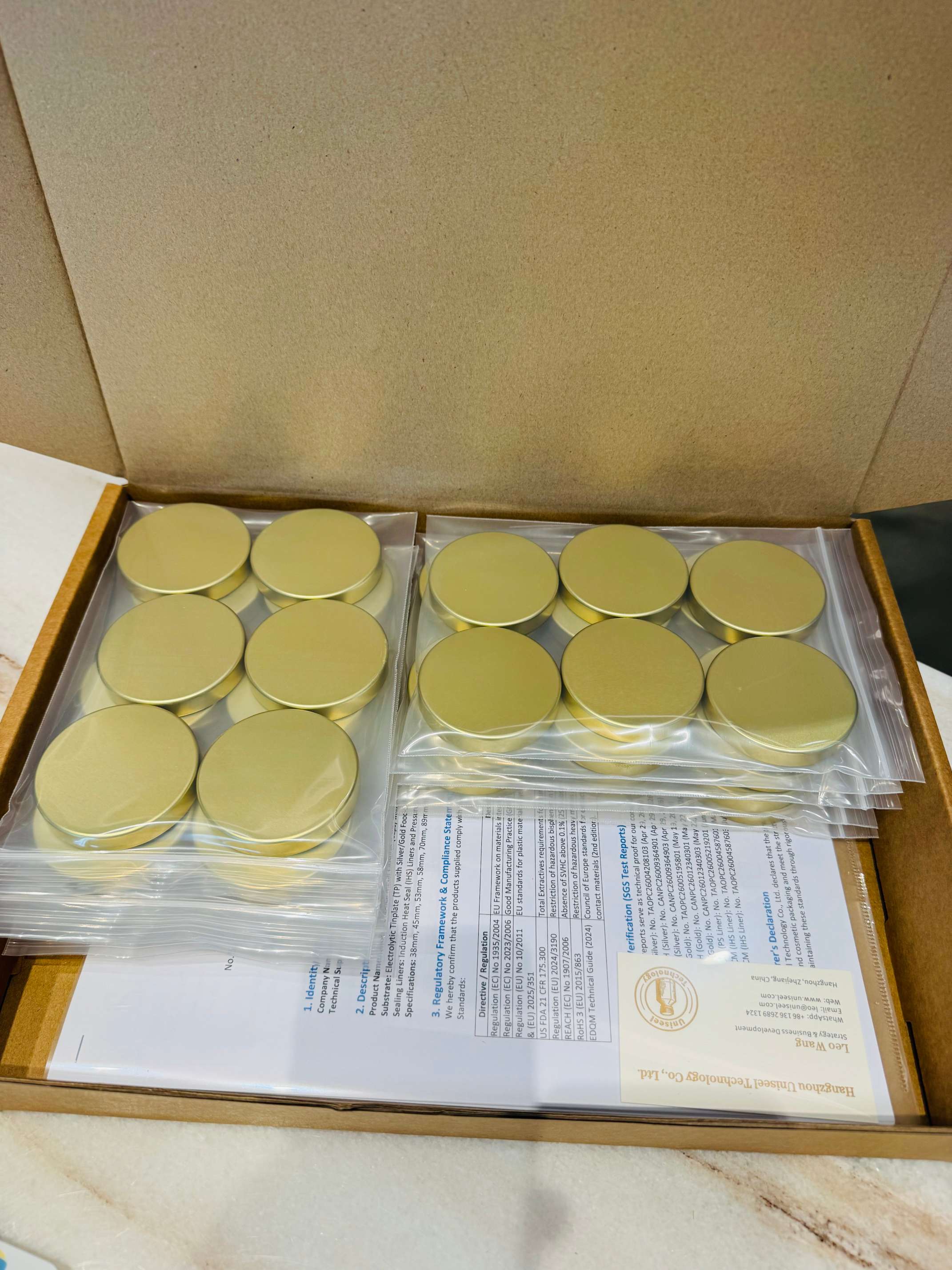 uniseel-58mm-gold-cap-air-freight-sample-package-sgs.jpg