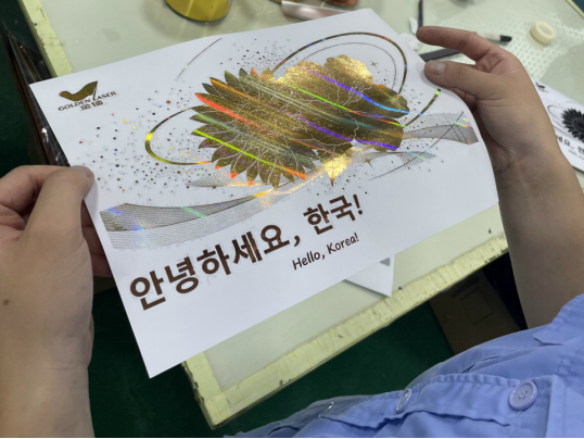 What is hot stamping and how does it work in packaging decoration?