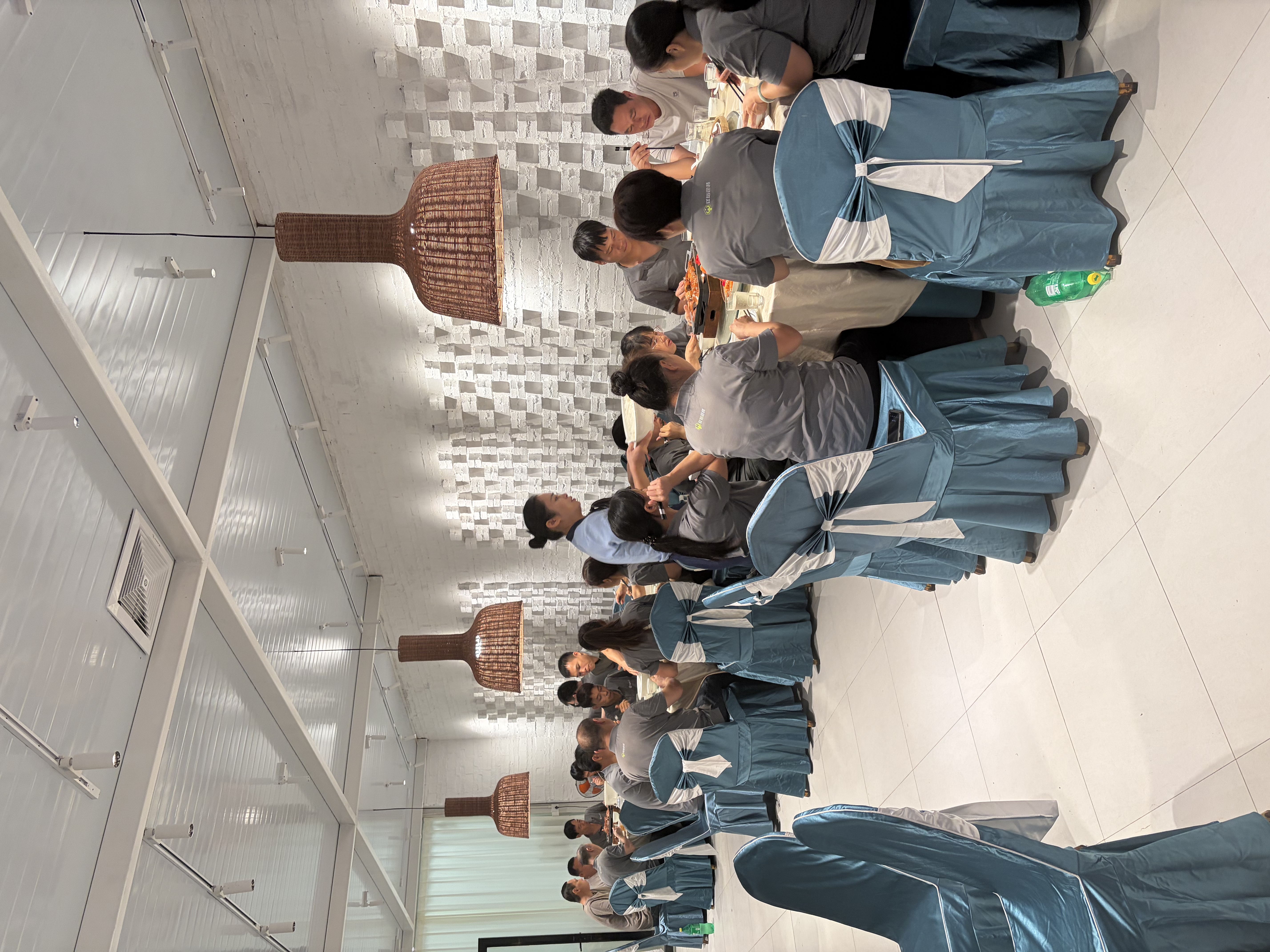 Employees enjoy the Mid-Autumn Festival team dinner