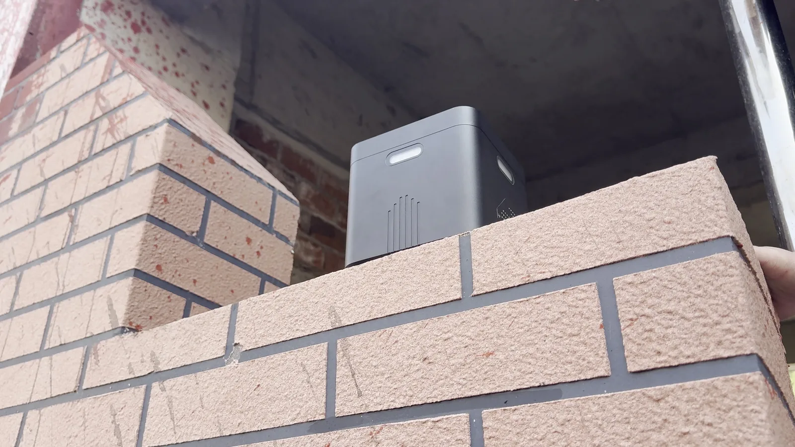 LSJ LS-D01 placed on a damaged brick wall ledge to monitor post-earthquake structural stability