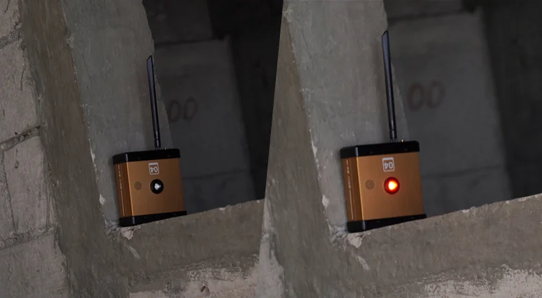 LSJ YZ-120 external wireless sound and light alarm node mounted on a concrete structural column, red strobe activated when the movement threshold is exceeded