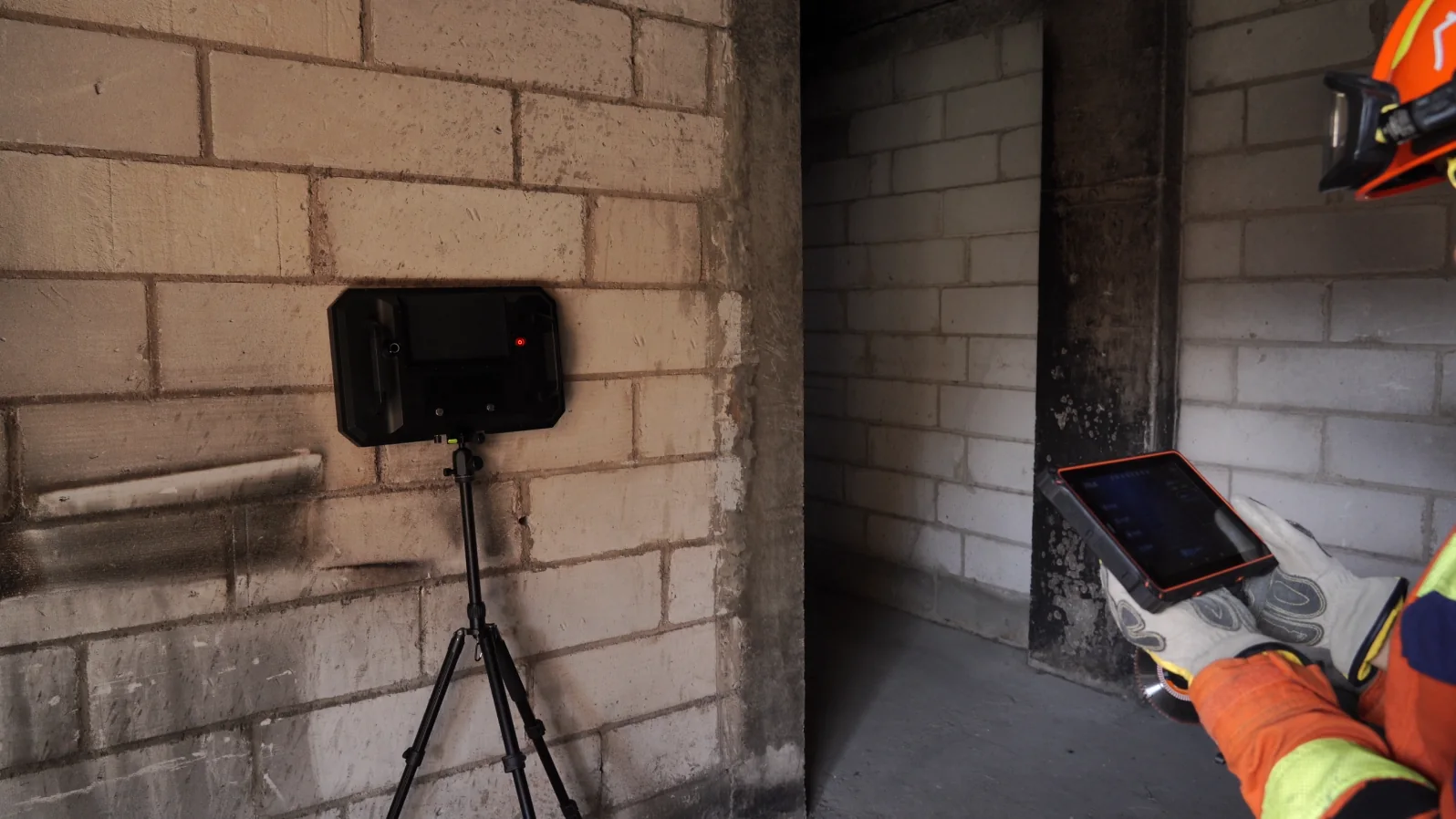 LSJ HX-RI radar life detector on a tripod with an operator using the wireless display terminal