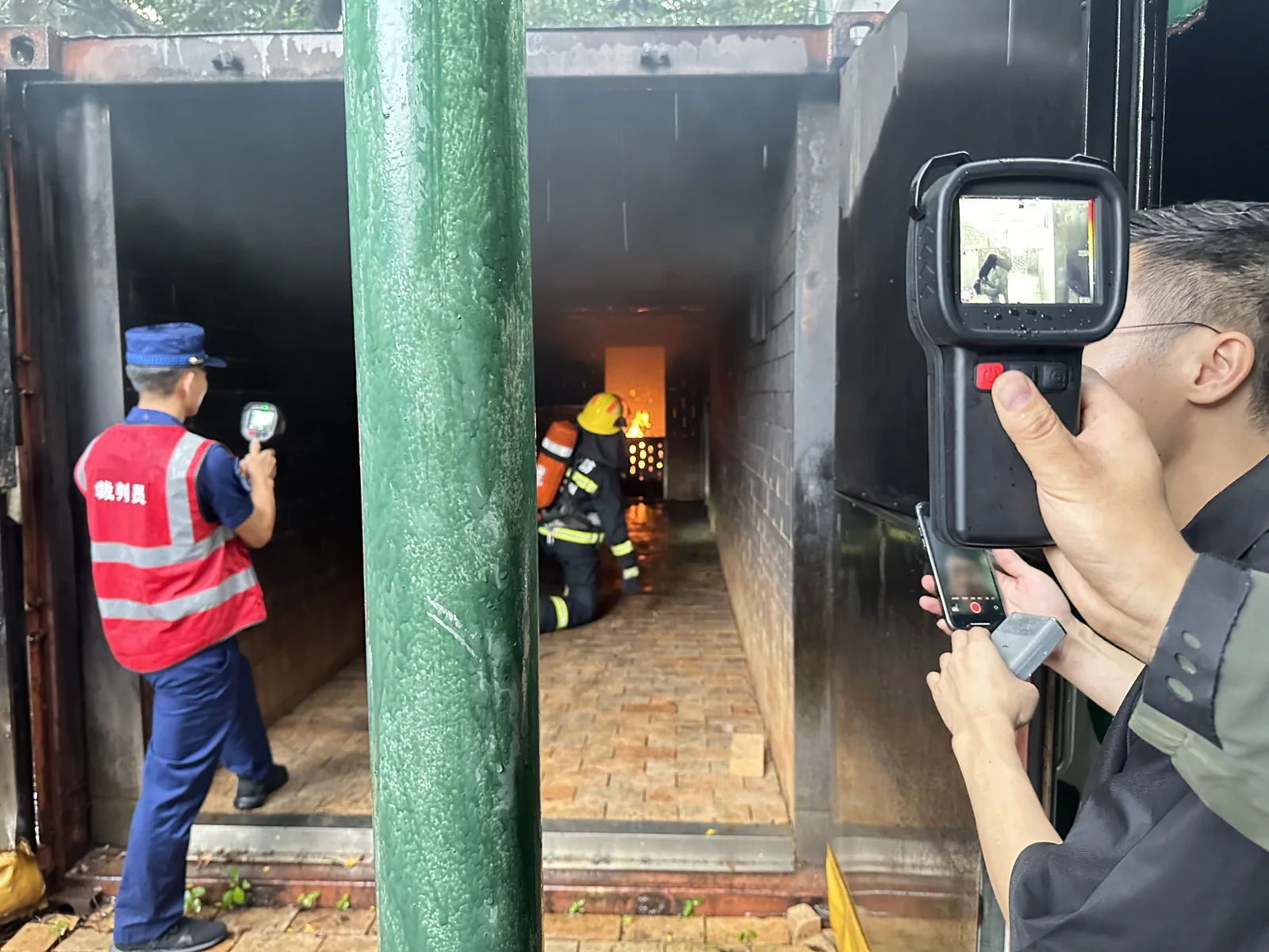 S1200 firefighting thermal imaging camera used during a fire-rescue field demonstration
