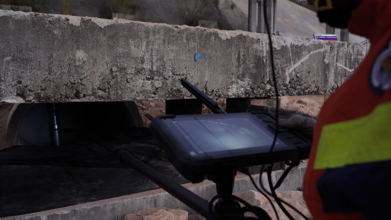 LSJ-C-E display terminal on a stand showing the live probe feed from beneath a collapsed concrete slab for rear command monitoring