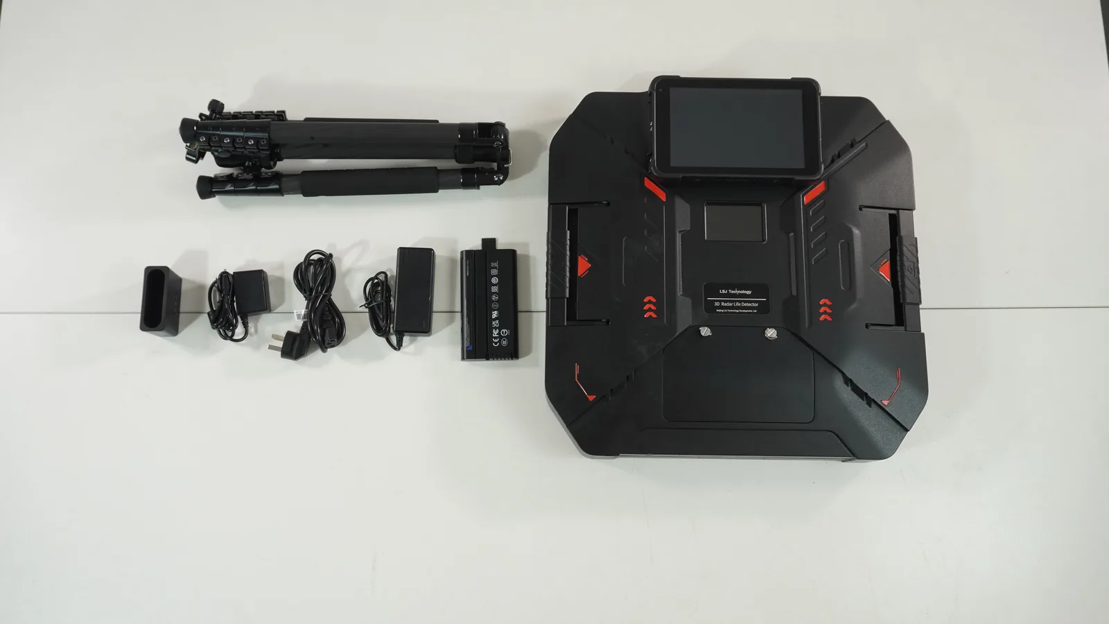 Complete LSJ TWR-III kit laid out: radar host, 8-inch terminal, tripod, spare battery, charger and cables