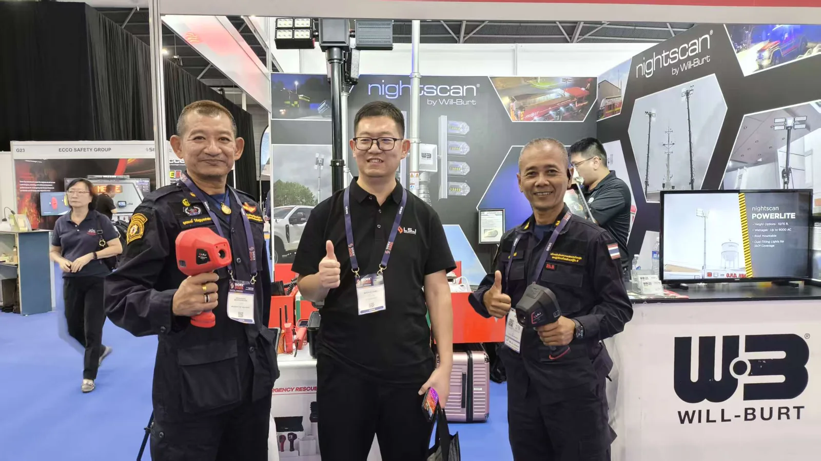 IMG-02 | Handheld Life Detection Devices with Rescue Officers LSJ representative with visiting rescue officers holding LSJ handheld life-detection devices at SIDEX 2025