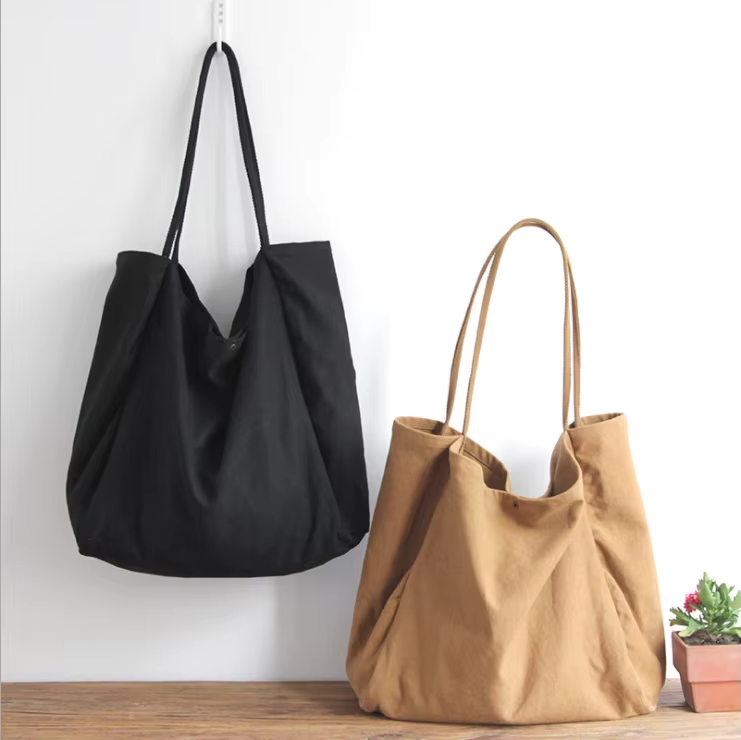 ¿Por qué es cómodo llevar un bolso de algodón en el hombro?
