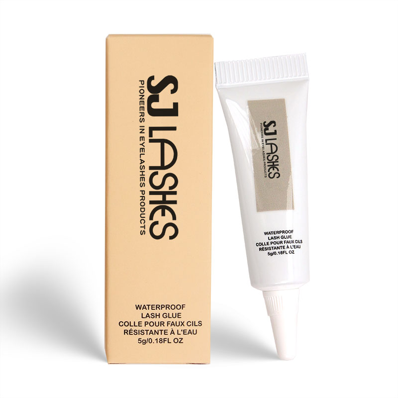 مصنع SJ LASHES بالجملة: علبة ورقية صفراء لتغليف لاصق الرموش مع أنبوب ملصق يُفعَّل بالأشعة فوق البنفسجية | أنبوب لاصق مخصّص بشعارك الشخصي، وعلبة تجزئة جاهزة للبيع، وتصنيع حسب الطلب (OEM)