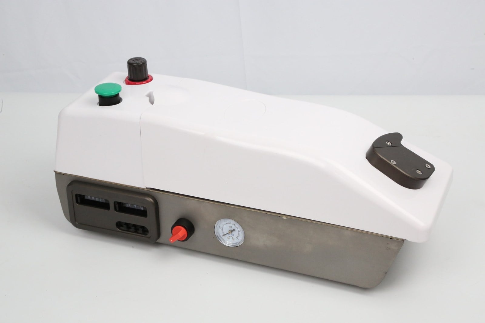 Close view of pneumatic vaccine machine