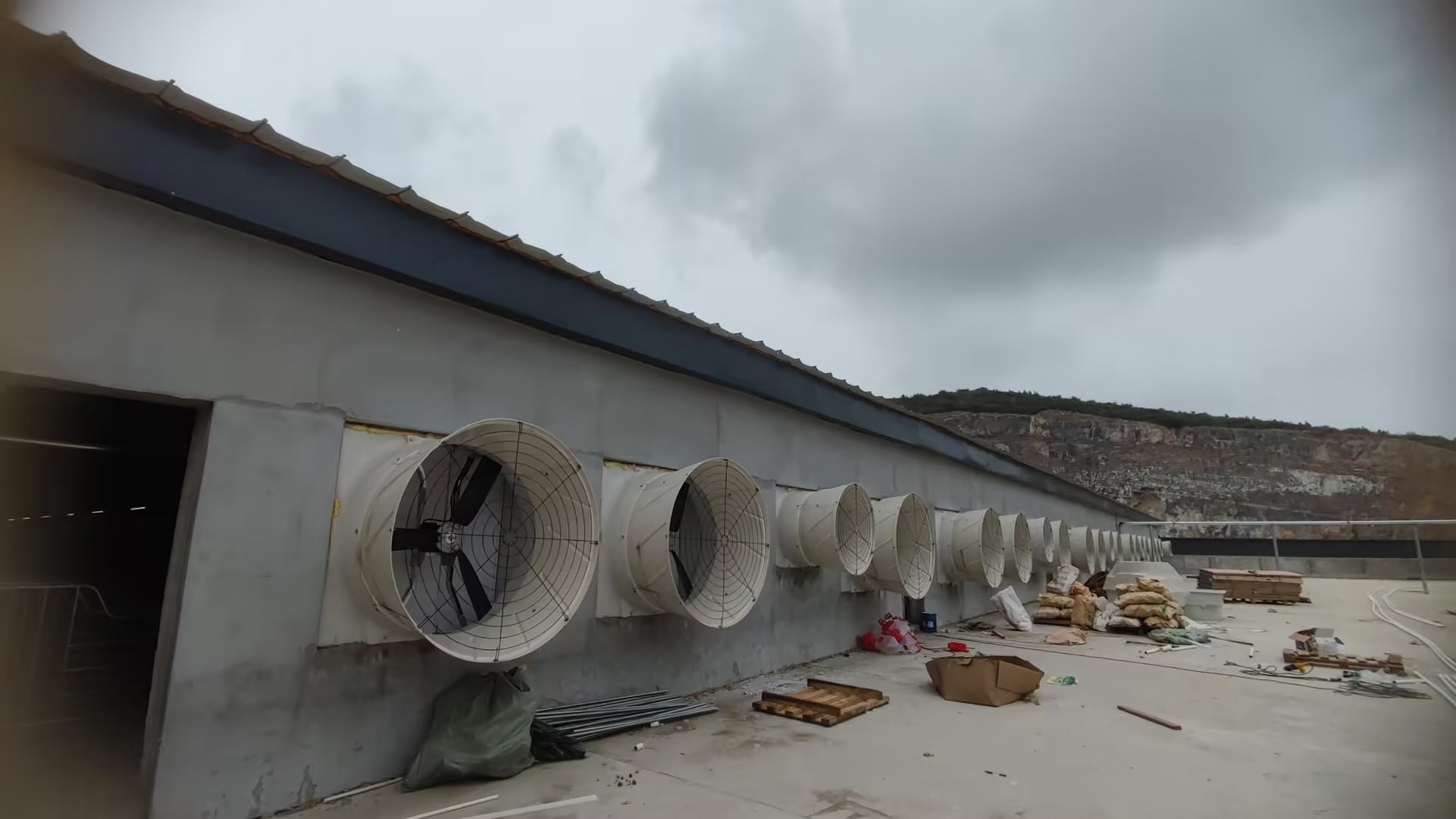 Ventilation fans installed on the pig house wall