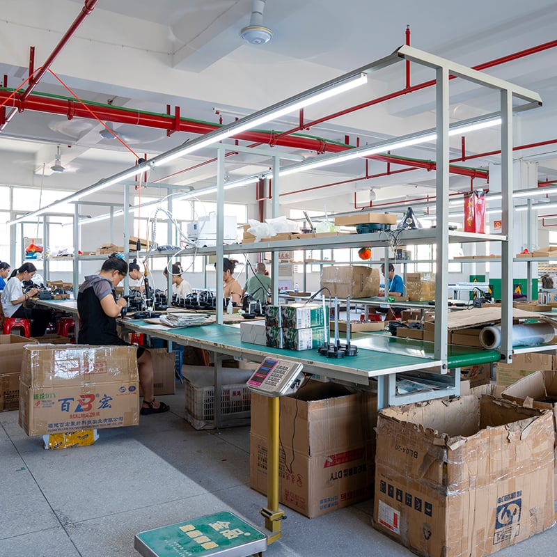 How can automation improve consistency in metal spiral wind spinner manufacturing?