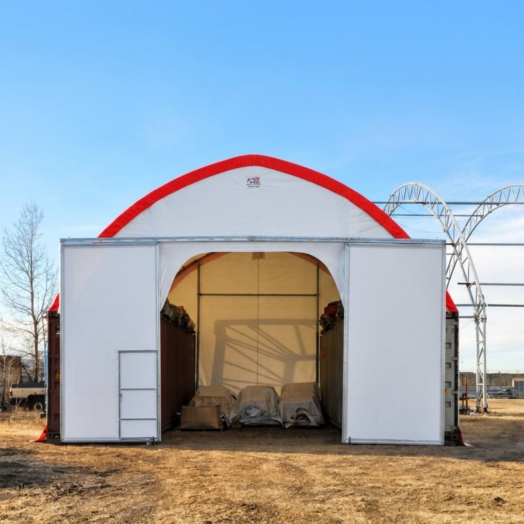 Galvanized Structural Steel Tubing shipping container tent with 14' X 14' Vehicle Door and Integral Personal Door
