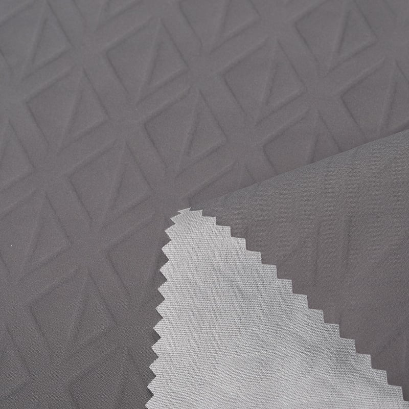 Why PU Coated 2 Layers Fabric Dominates Waterproof Sports Wear Production