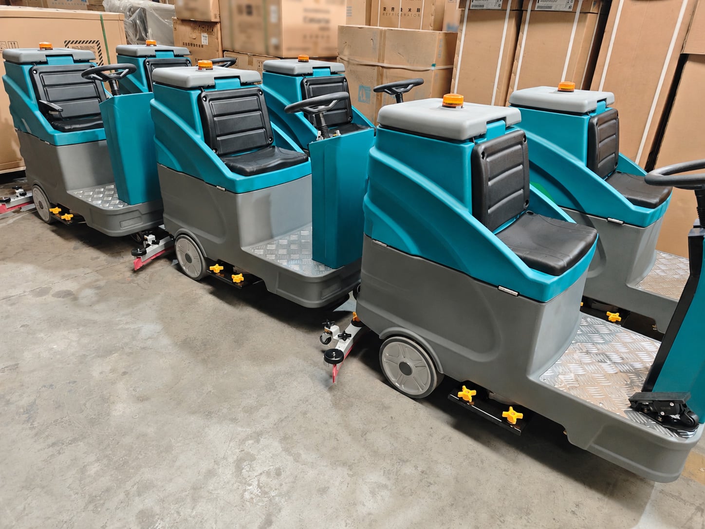 Bulk Delivery of Ride-On Floor Scrubbers for a Warehouse Cleaning Project