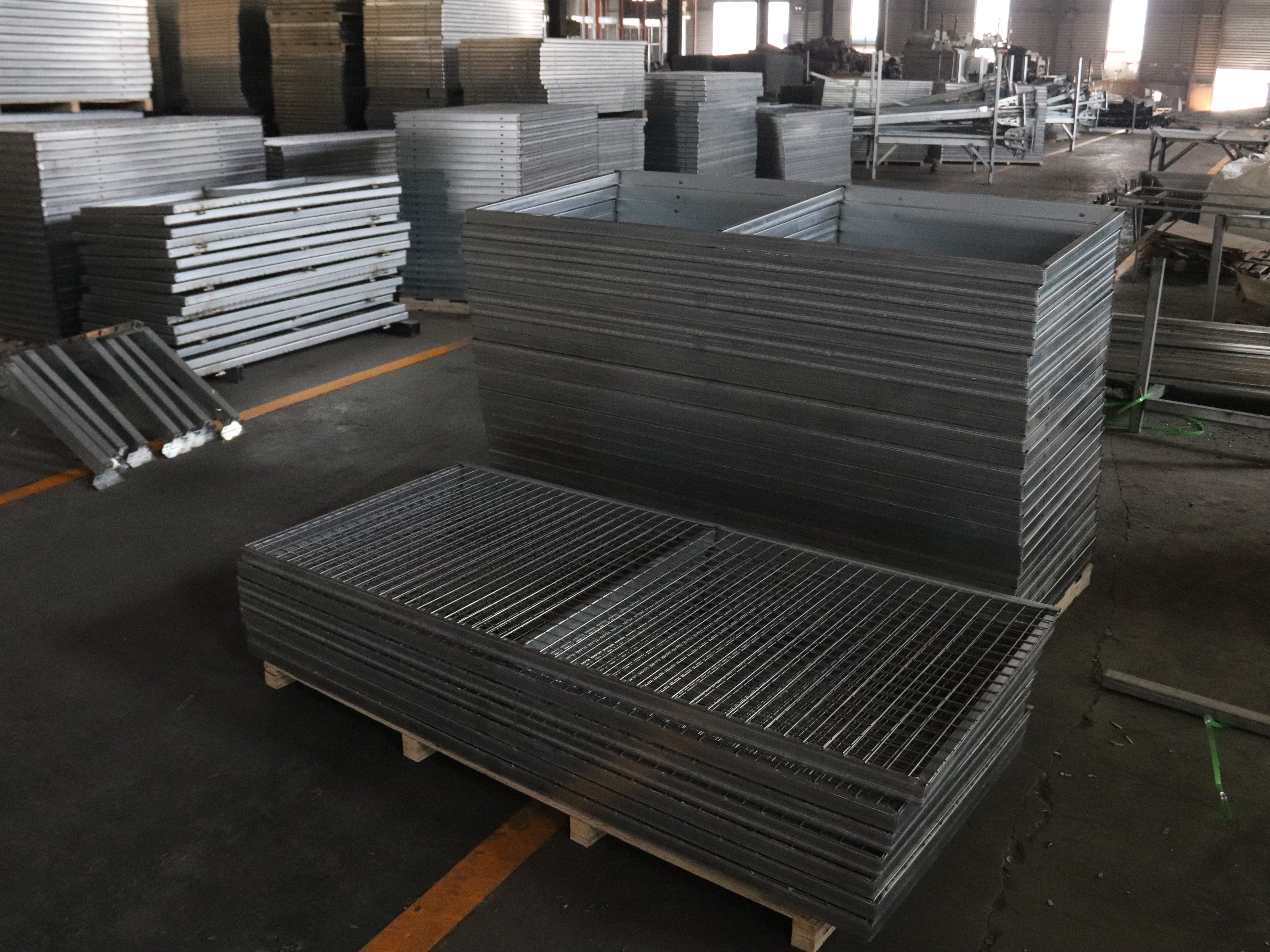 Finished product stacking - metal grid frame zoning and stacking