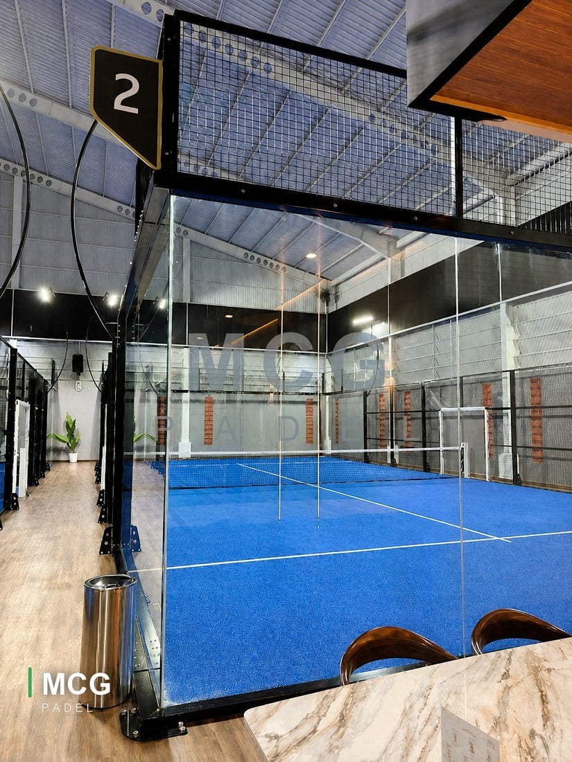 Indoor padel court number 2 installed by MCG, seen from the club walkway