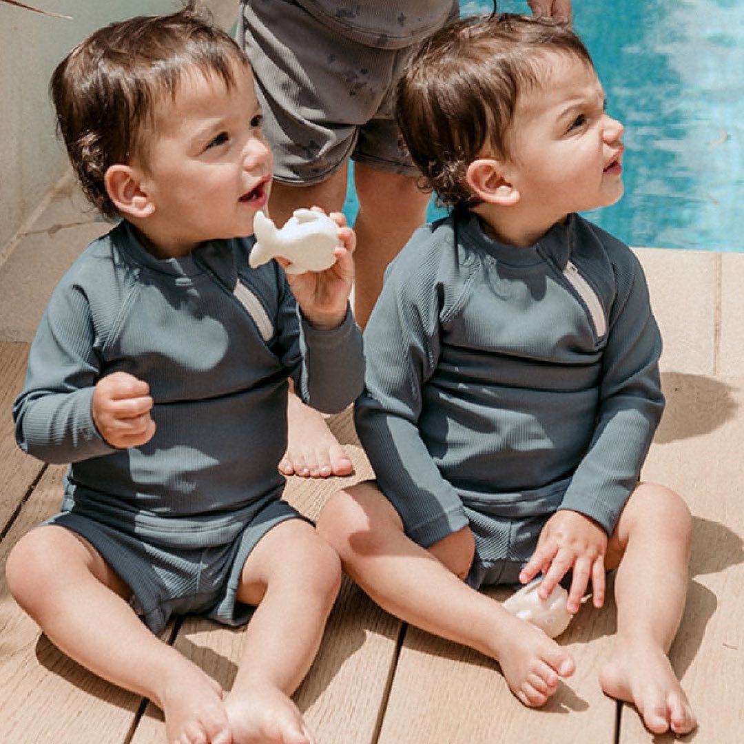 Applications of Children's Long Sleeve Swimsuits in Various Markets