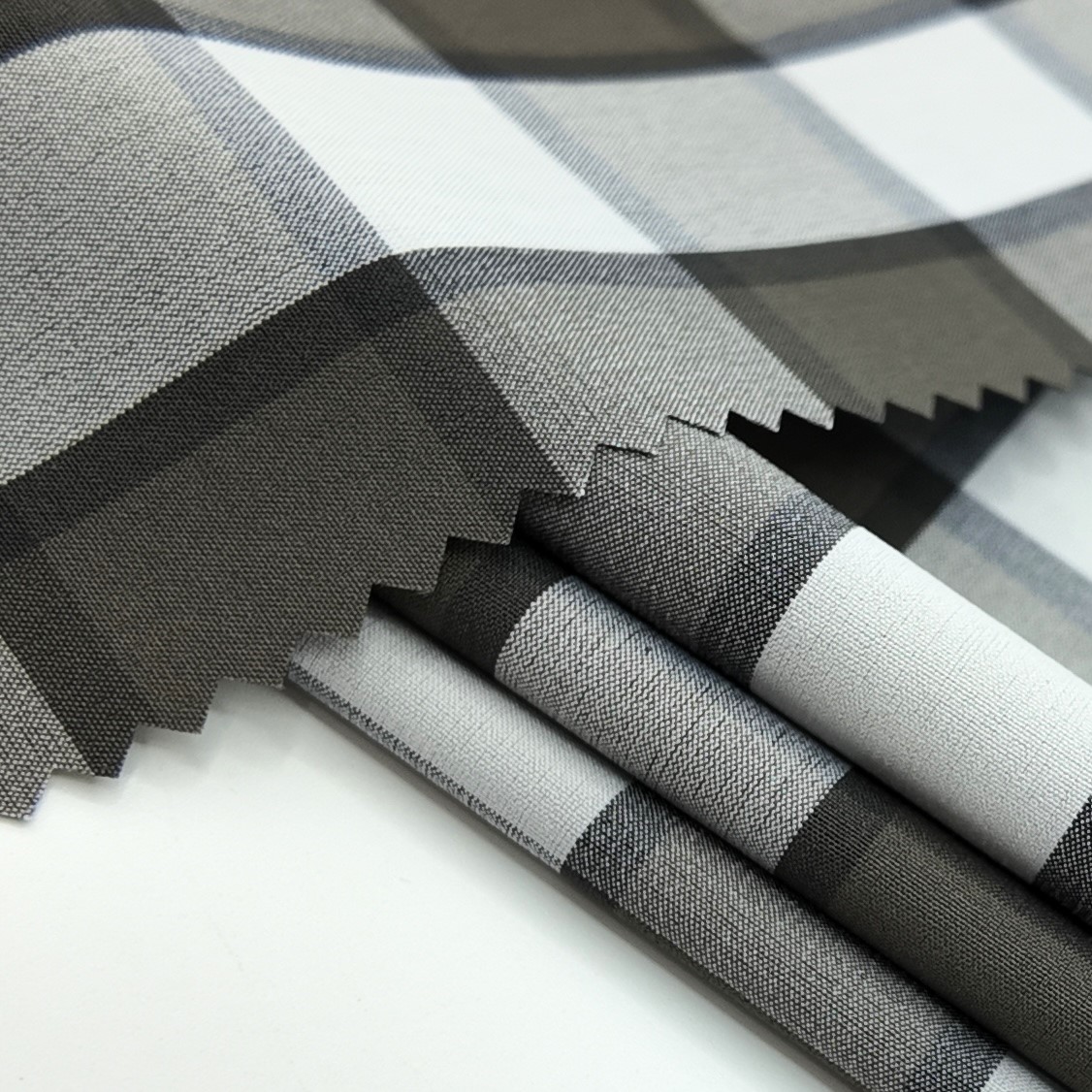 What Common Issues Do Buyers Face When Sourcing Polyester Stretch Material?