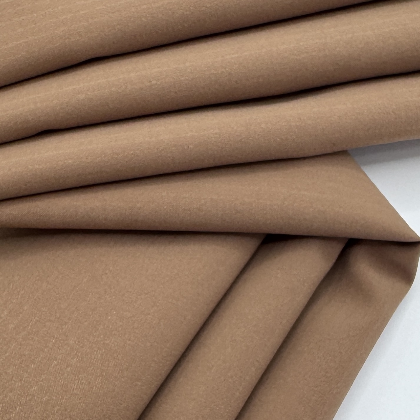 What Makes Stretch Cloth Material Ideal for Fashion and Apparel?