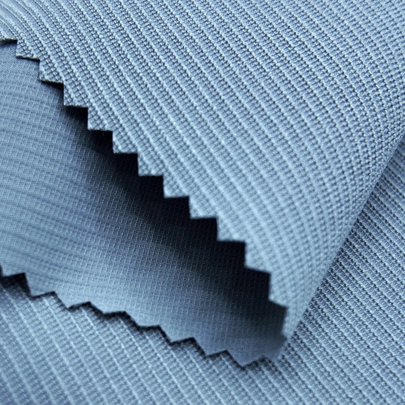 How Polyester Spandex Blend Fabric Enhances Comfort and Durability in Clothing
