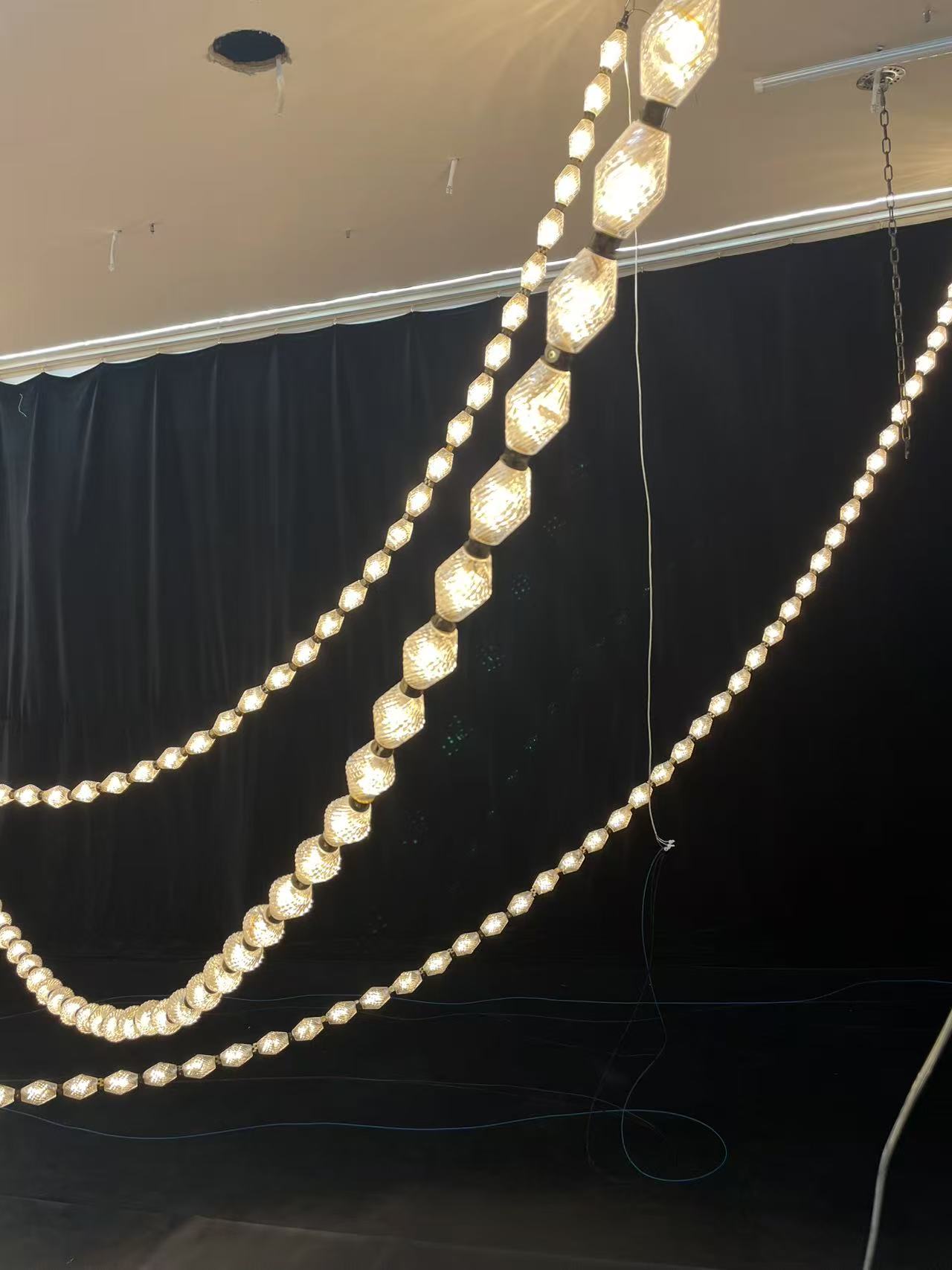 Custom Project Hotel Living Room Stair LED Hanging Lamp Luxury Long String Metal Crystal Chandelier Pendant Light supplier