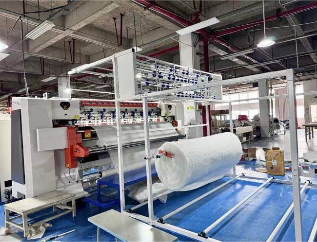 Multi-needle quilting machine