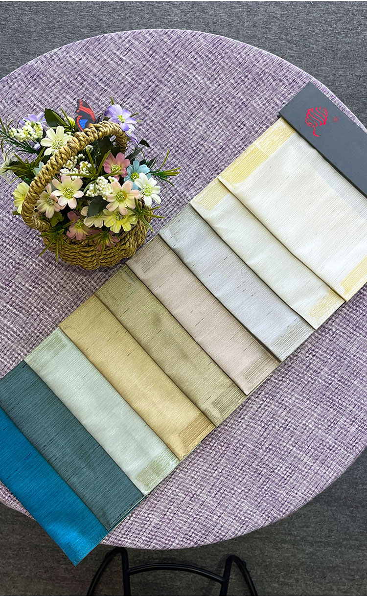 Layered window styling with dark sheer and blackout curtain—soft daylight and privacy control