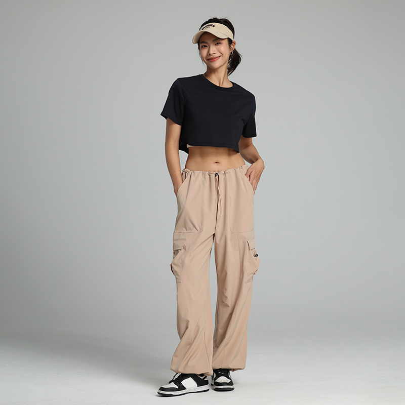 Pantaloni cargo da donna con vita elastica, a gamba larga con coulisse e molte tasche