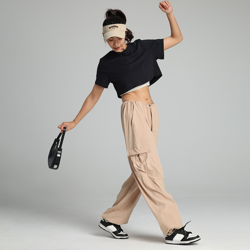 Pantaloni cargo da donna con vita elastica, a gamba larga con coulisse e molte tasche