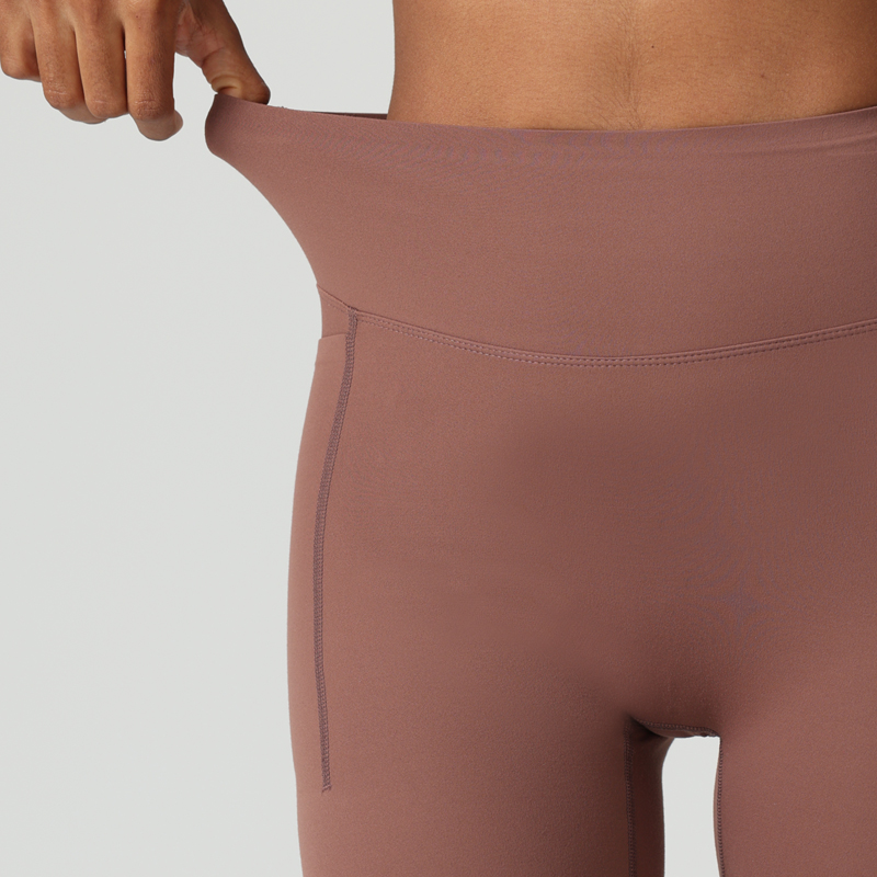 Short da palestra e yoga traspiranti con vita alta e controllo addominale, dotati di tasche laterali