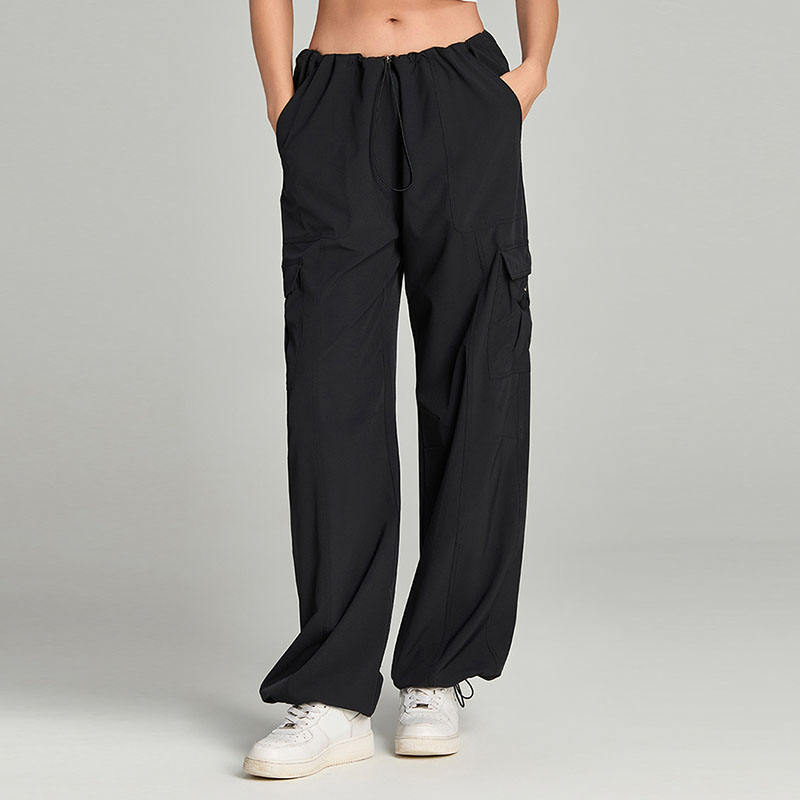 Pantaloni cargo da donna con vita elastica, a gamba larga con coulisse e molte tasche