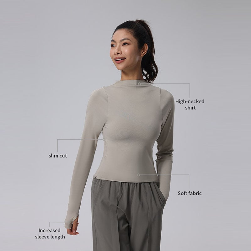 Haut de yoga à manches longues et col haut, coupe ajustée, avec trous pour les pouces et tissu ultra-doux