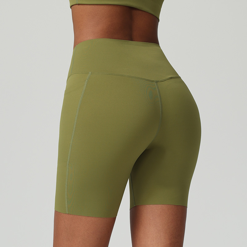 Short da palestra e yoga traspiranti con vita alta e controllo addominale, dotati di tasche laterali