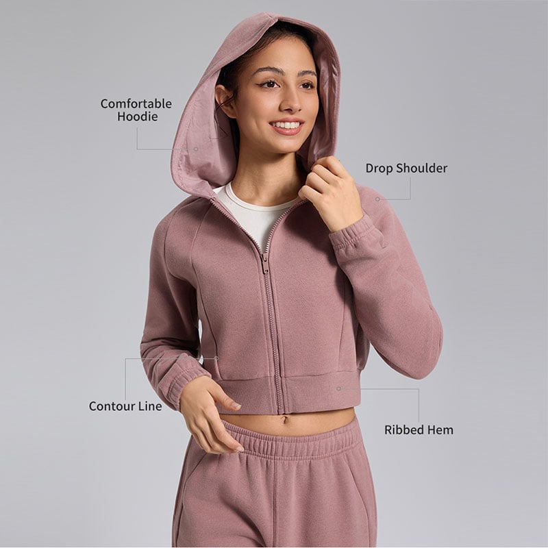 Sweat à capuche zippé court pour femme – coupe moulante, ourlet côtelé, vêtement d’entraînement en molleton doux
