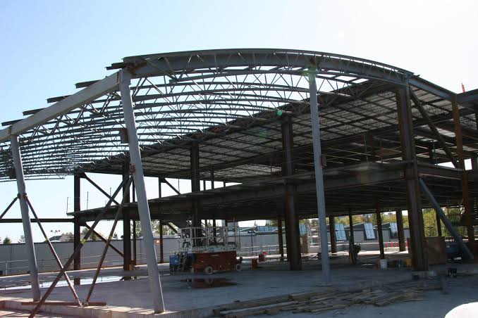 What are the design steps in custom steel fabrication for a unique architectural canopy?