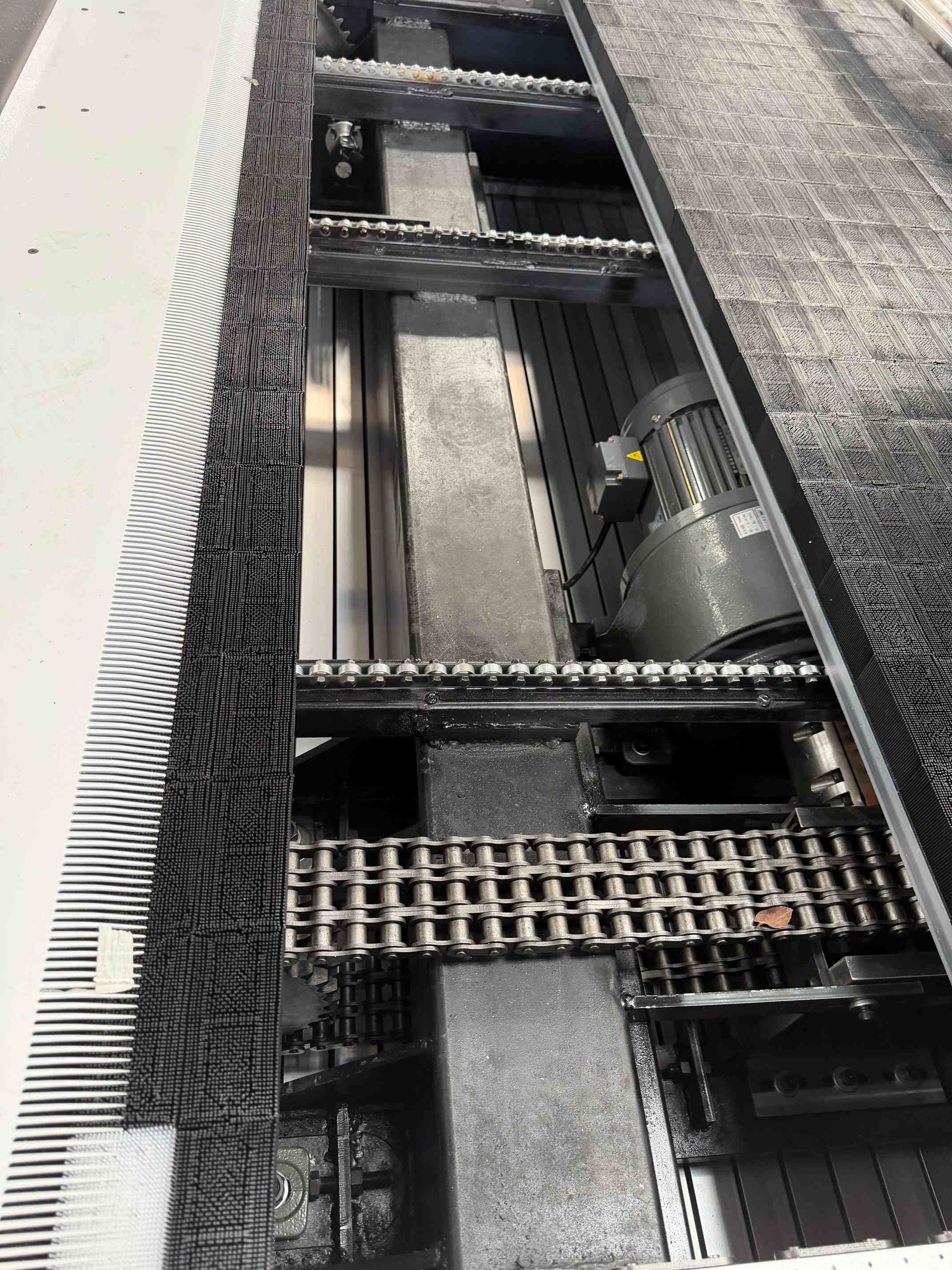 Reinforced machine frame and electrical components assembly