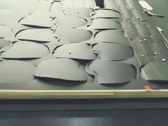 Automotive upholstery fabric cutting application