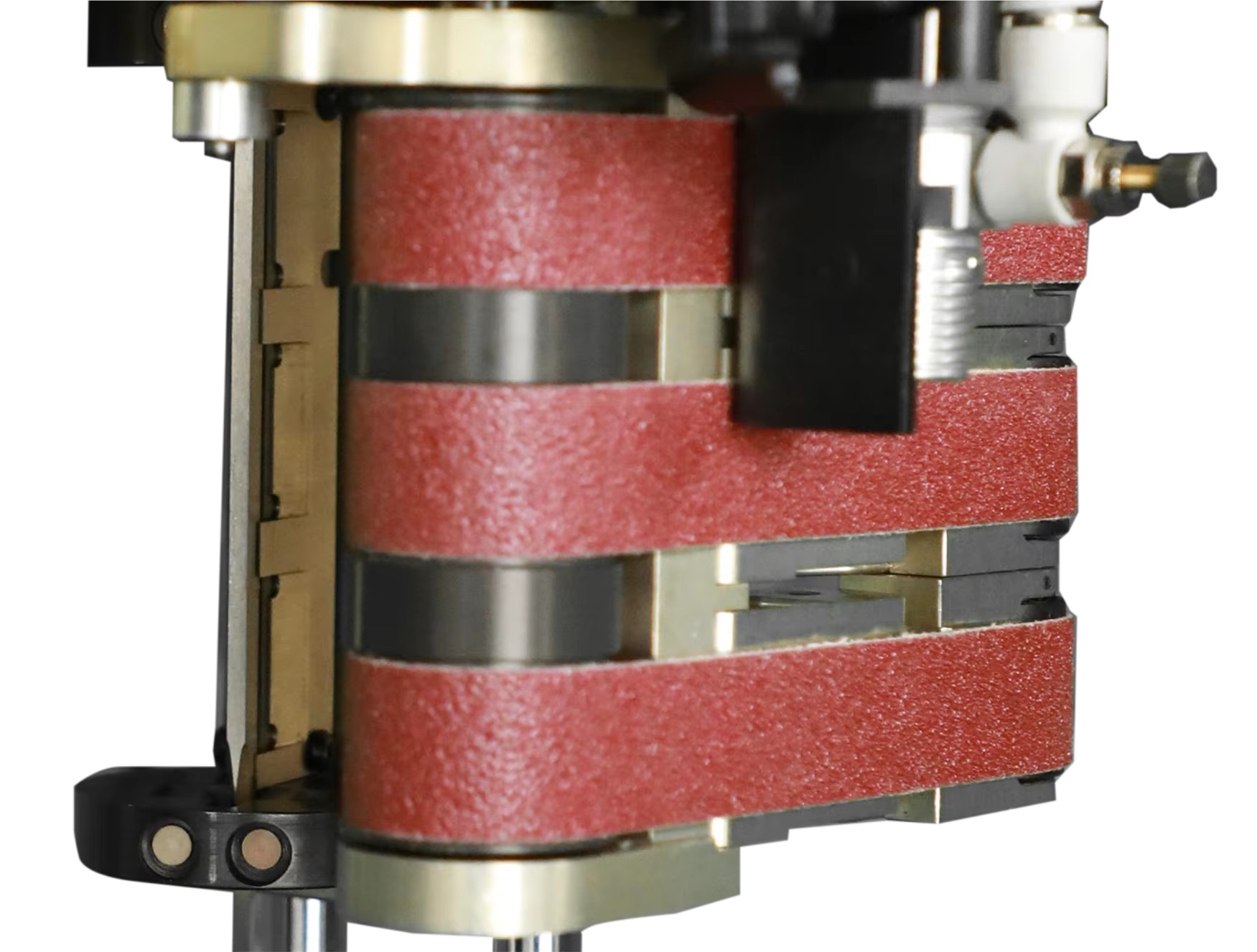 Sharpening system detail showing blade contact and abrasive belt