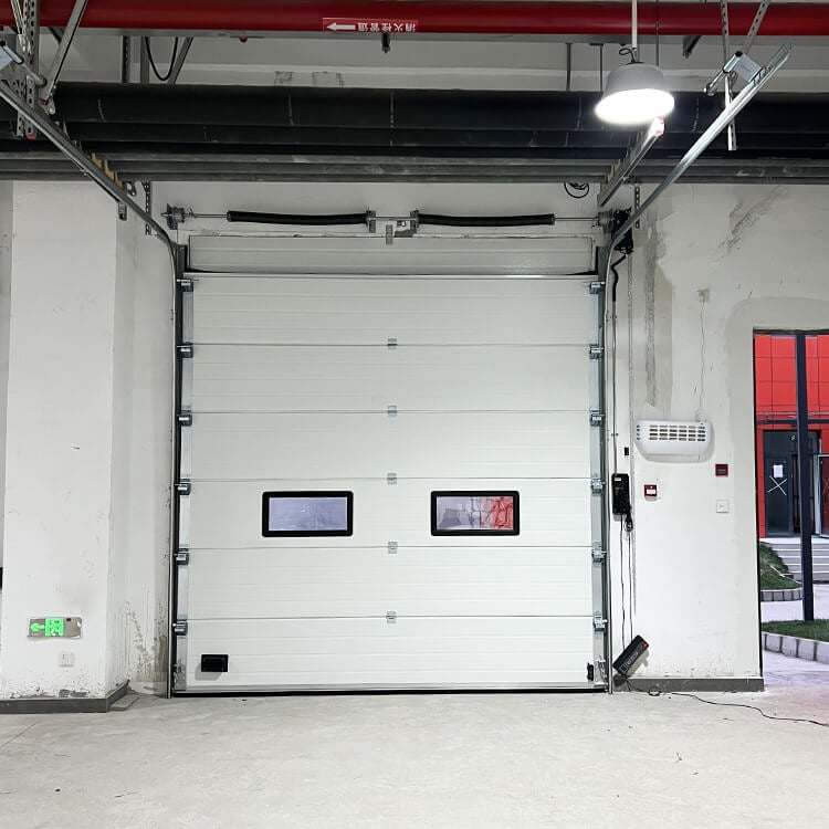What Makes Low Headroom Sectional Garage Doors Ideal for Limited Spaces?