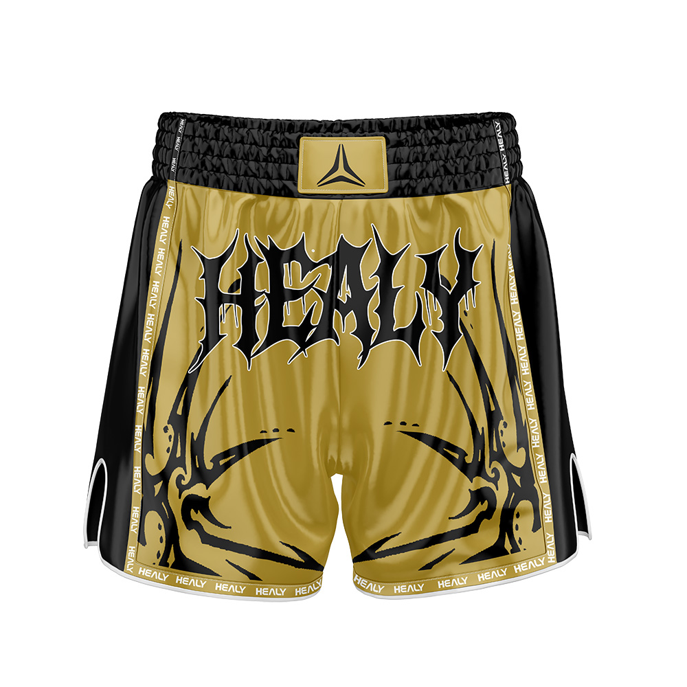 Tréninkové boxerské šortky Healy Gothic Gold Black z elastického polyesteru s přidaným spandexem, s možností individuálního potisku, vhodné pro MMA a zápasení – rychle suchoucí, lehké a dýchavé.