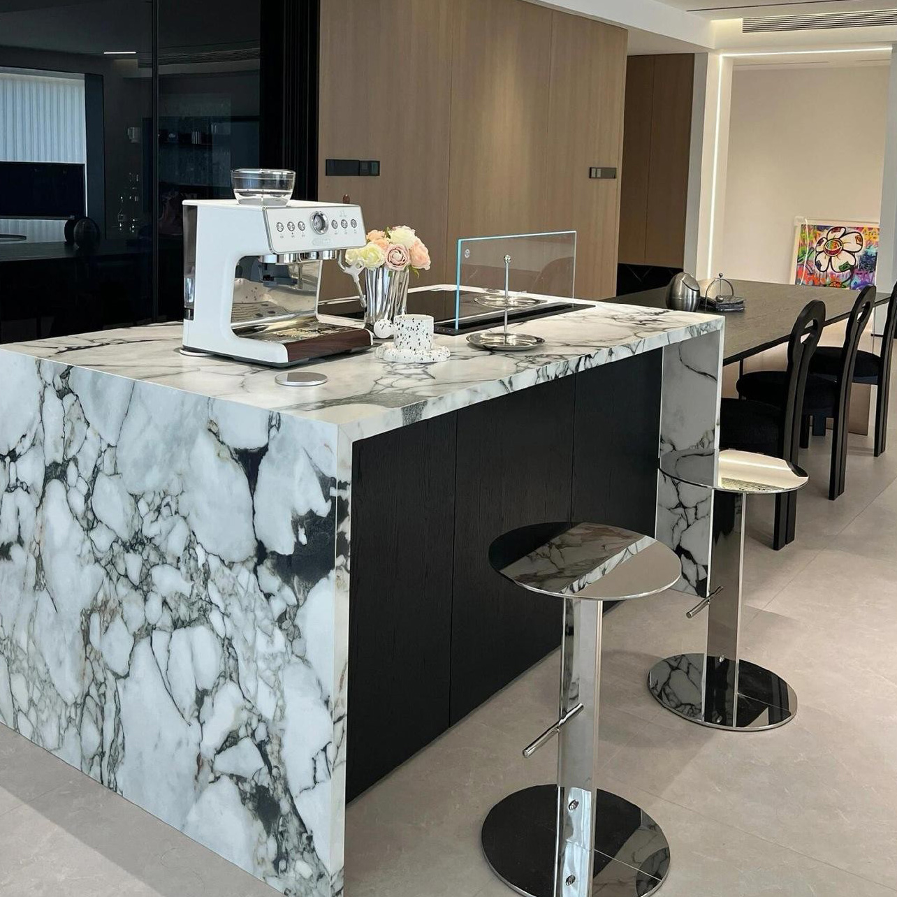 Custom natural marble island for open kitchen and dining space
