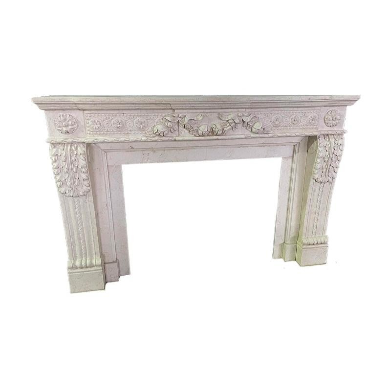 White marble fireplace with hand carved European details