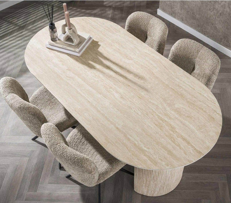 Oval long travertine dining table for minimalist interior project